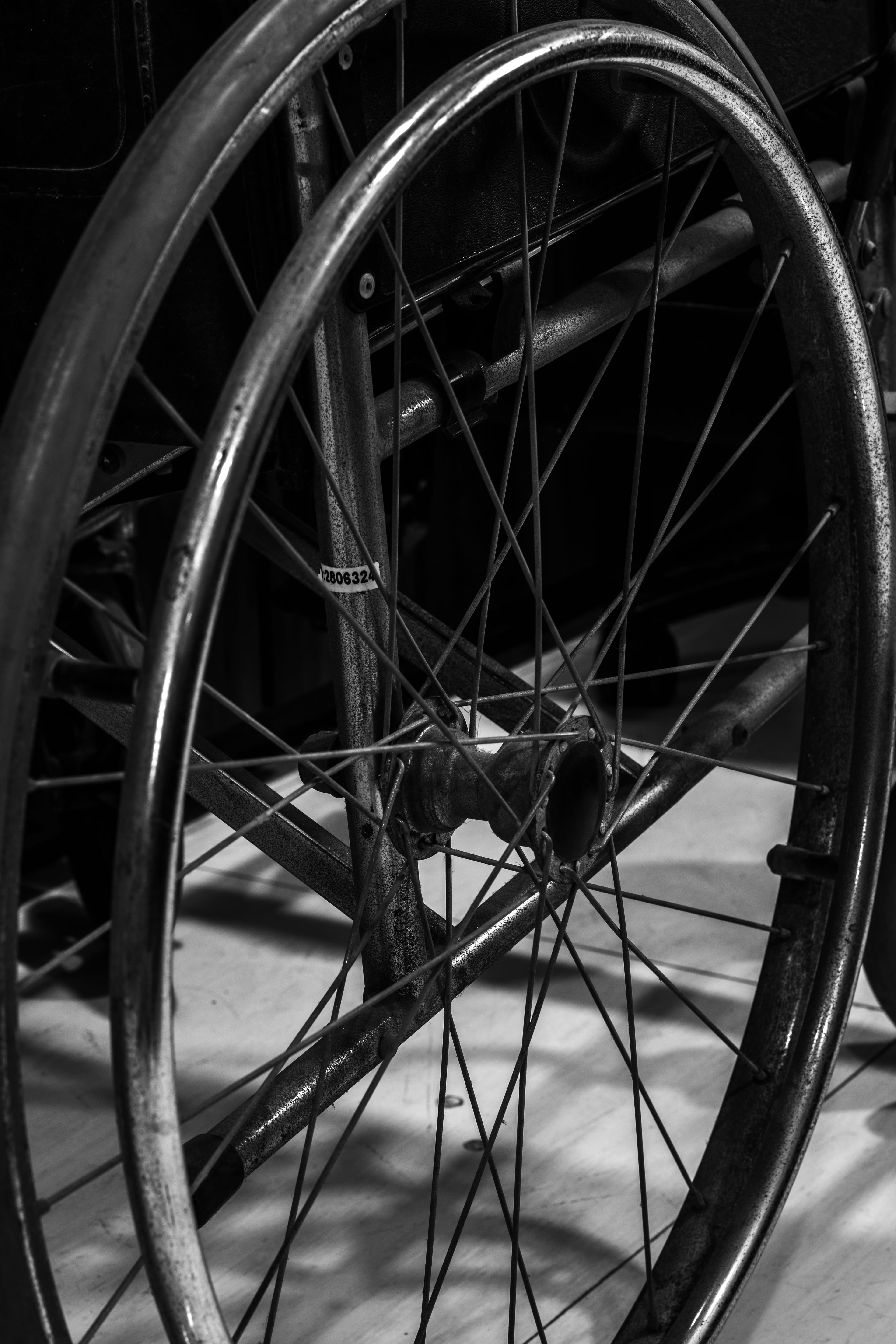 Close-up of wheelchair wheels and frame